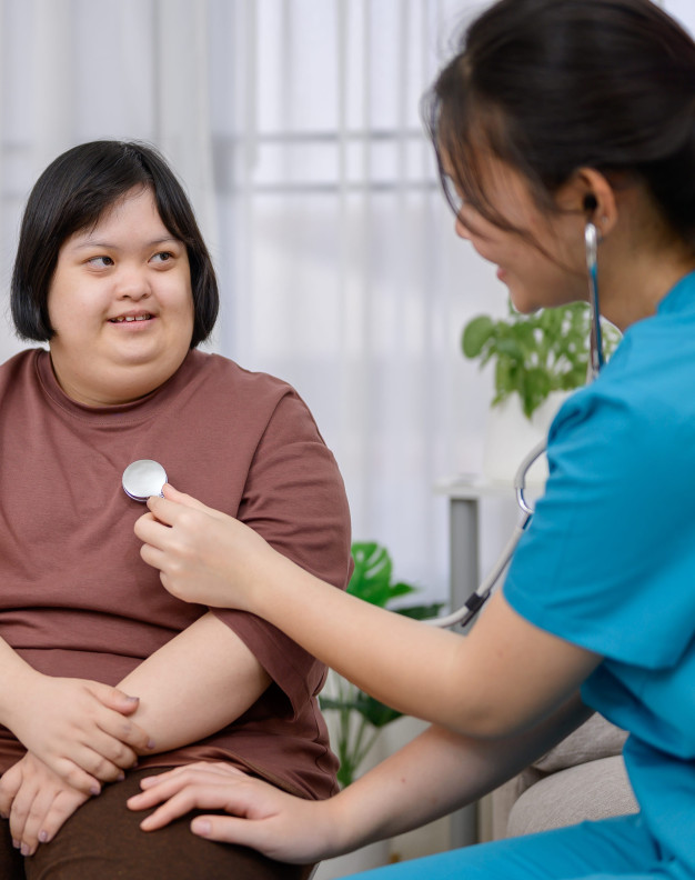 Nurse checking heart rate
